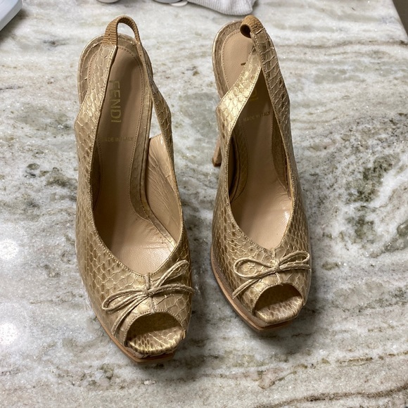 Fendi Shoes - Fendi sz 37 1/2 gold heels. Will fit size 6, brand runs small.